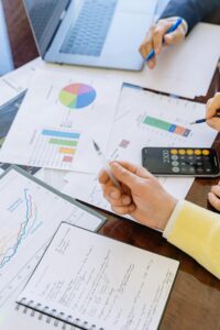 risk management services Images of charts and graphs to review insurance policies for comprehensive financial planning and risk management services.