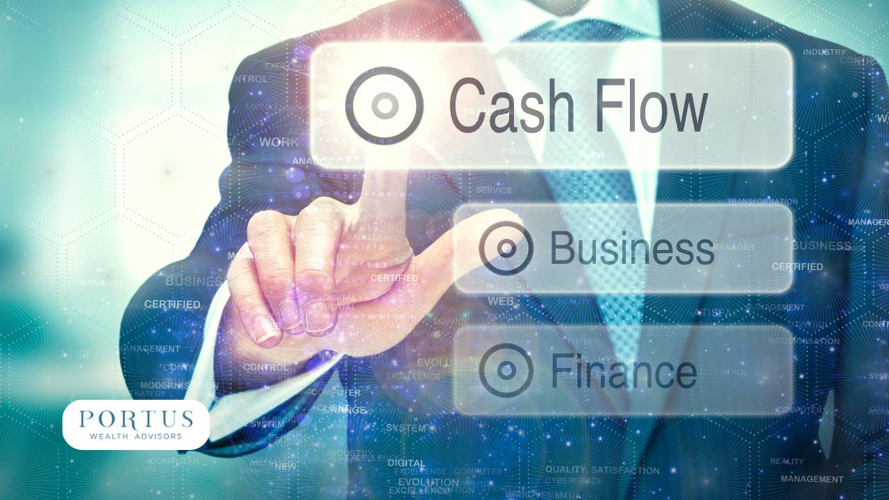 Main touching a holographic image of "Cash Flow" with another for "Business" and "Finance" below it.