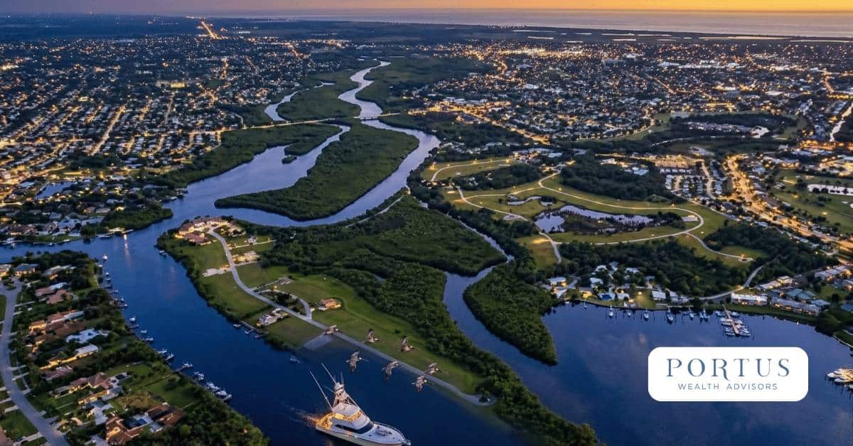 Image of St. Lucie Florida at twilight for the "Selling Your St. Lucie Business" blog post. Portus Wealth Advisors logo in the bottom right corner.