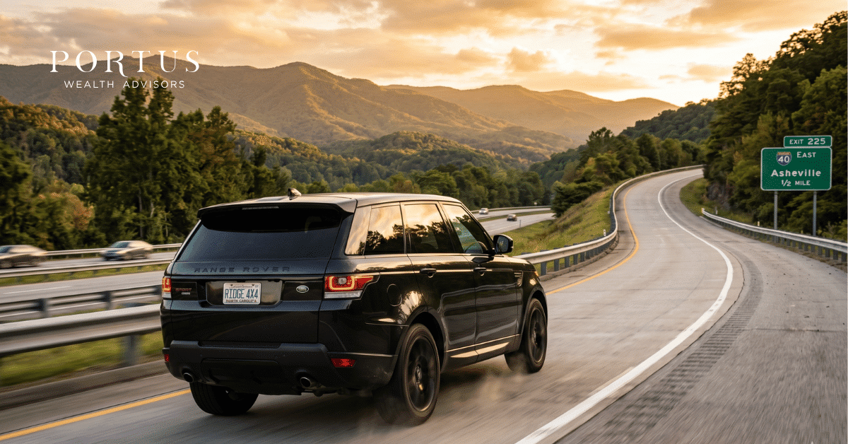 Featured Image for Exit Value Optimization blog post, featuring a black SUV heading up the exit ramp in the Blue Ridge mountains. Portus Wealth Advisors log in the top left.